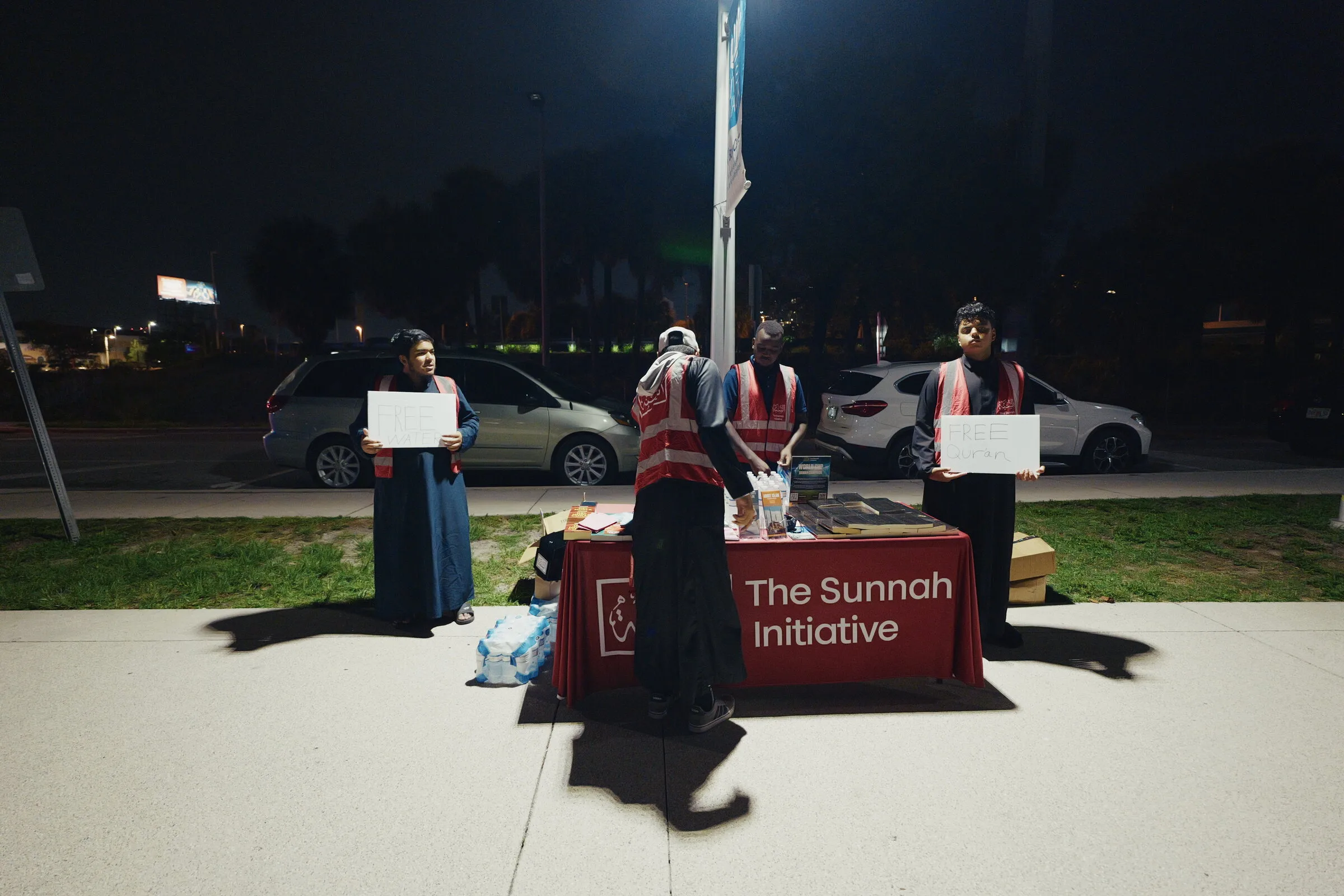 The Sunnah Initiative team at its Quran table on Tampa Riverwalk