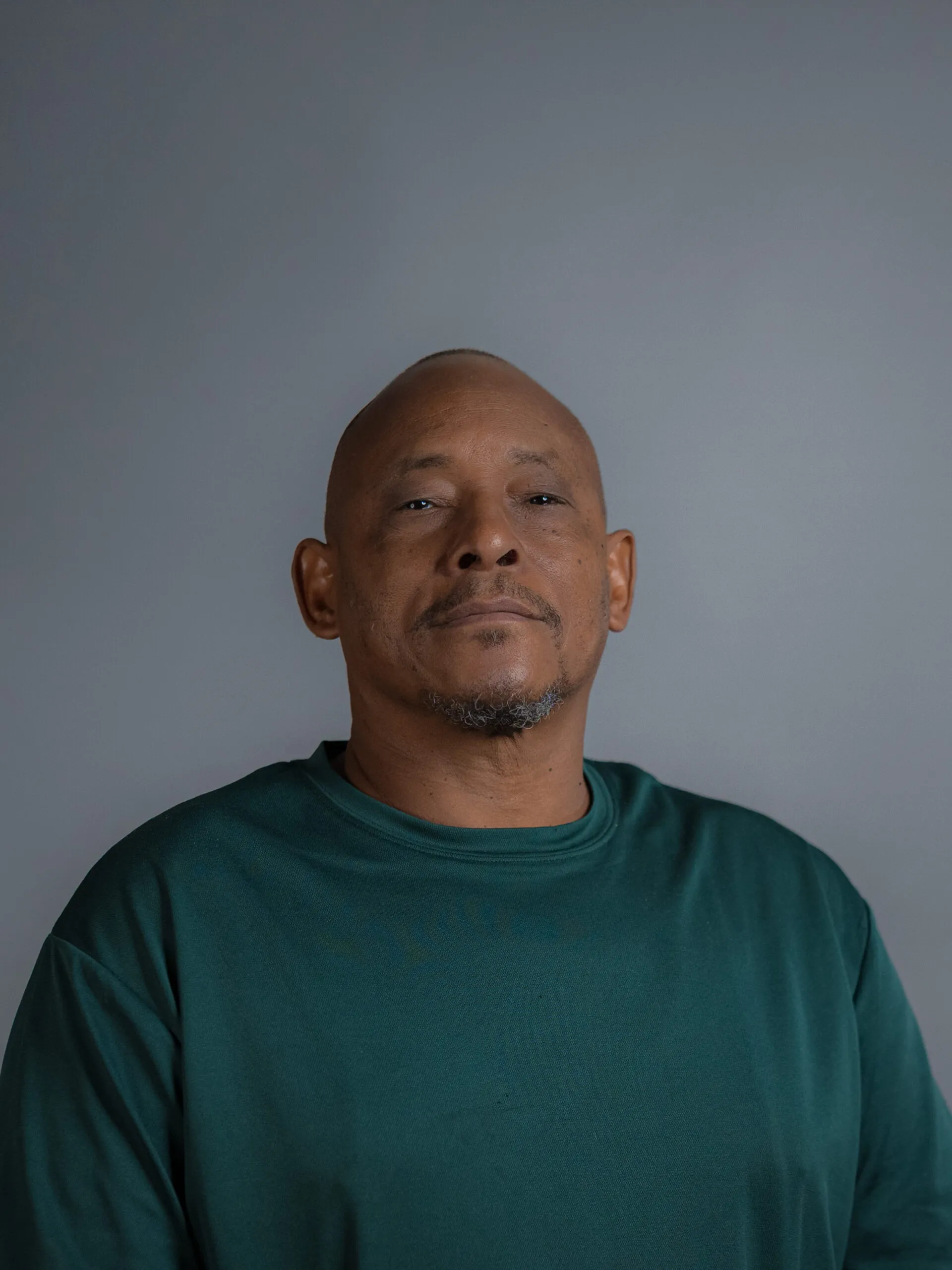 Professional headshot of Akbar Burden for Arqam Academy