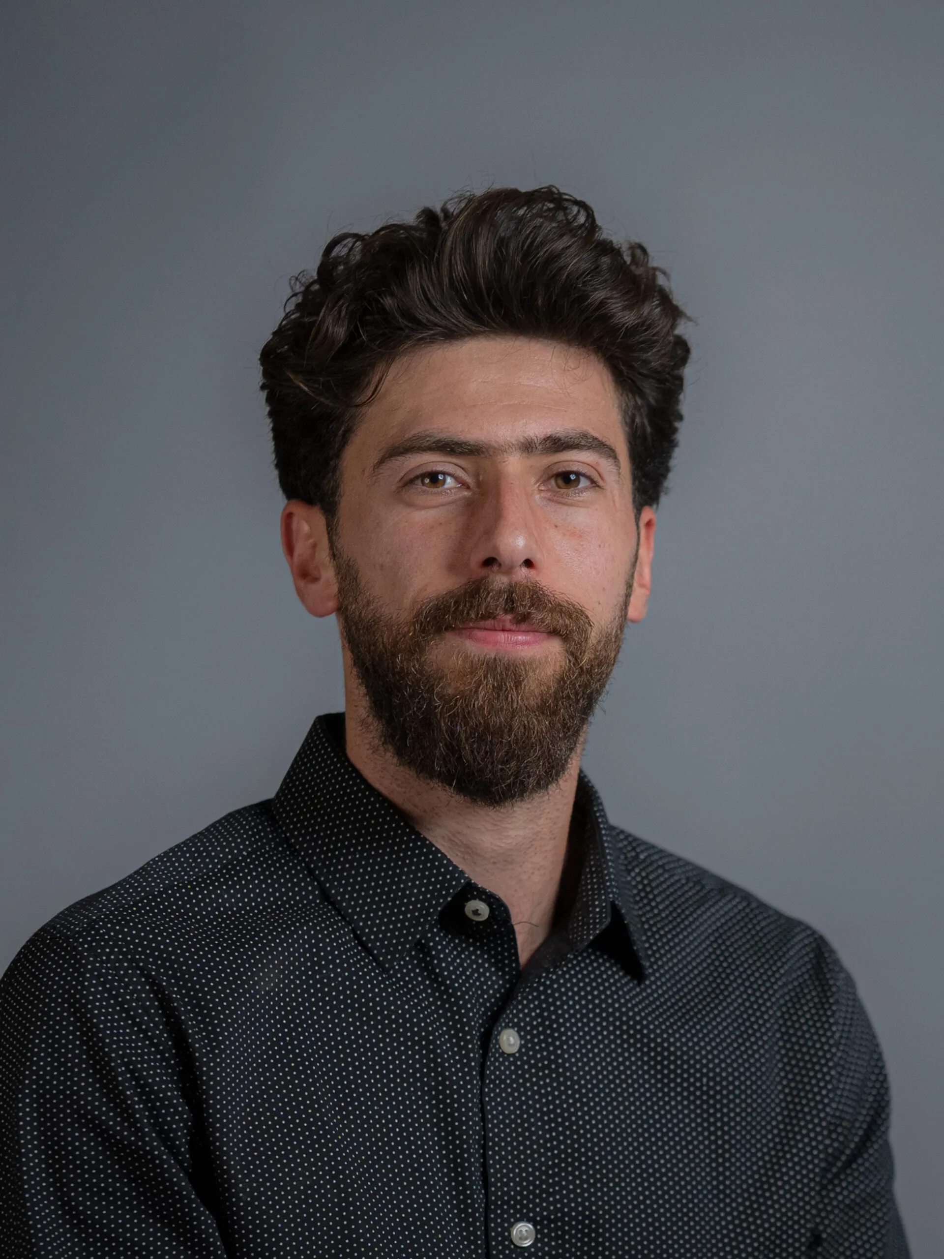 Professional headshot of Abdallah Oran for Arqam Academy