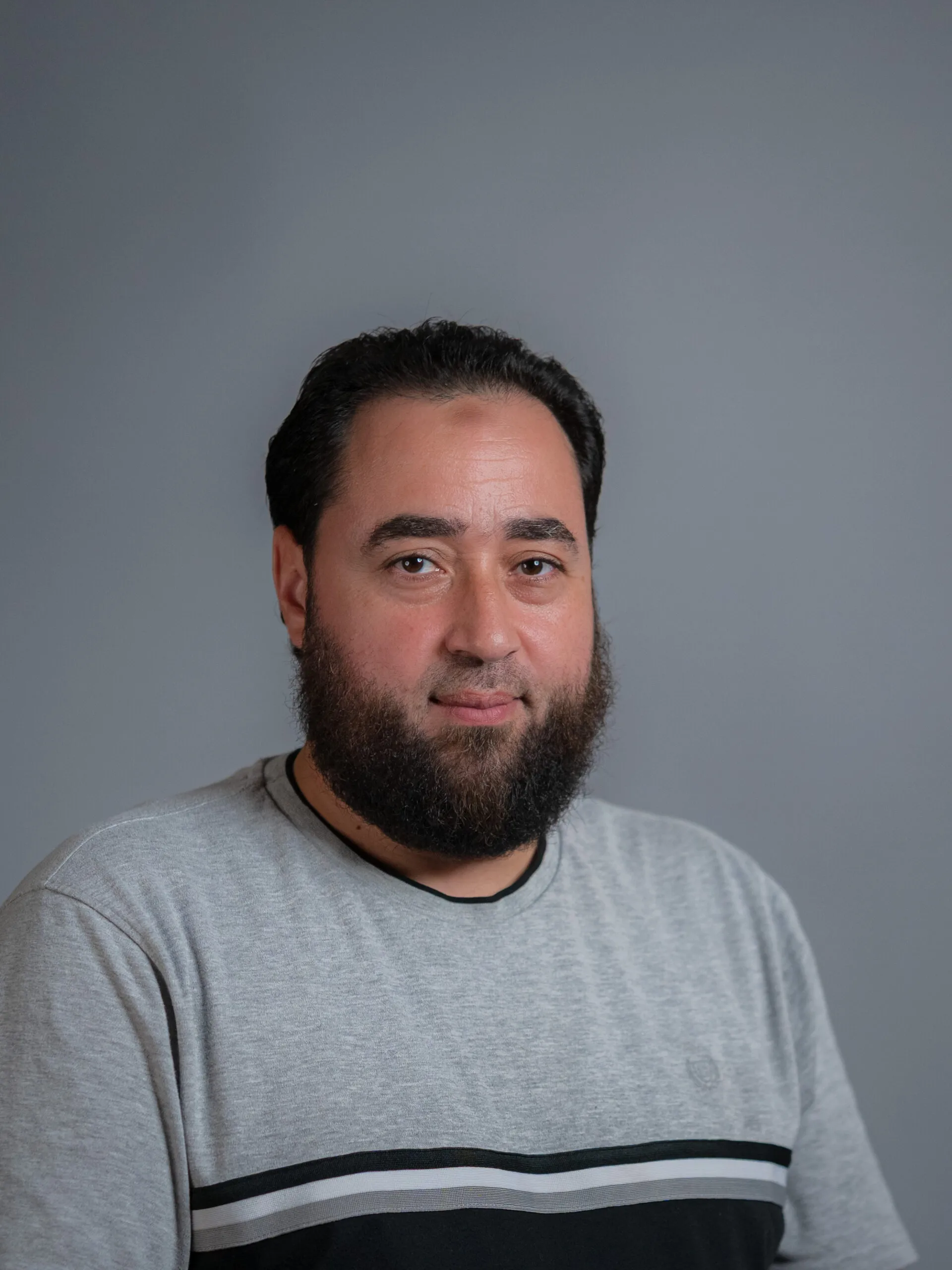 Professional headshot of Hesham Saad for Arqam Academy