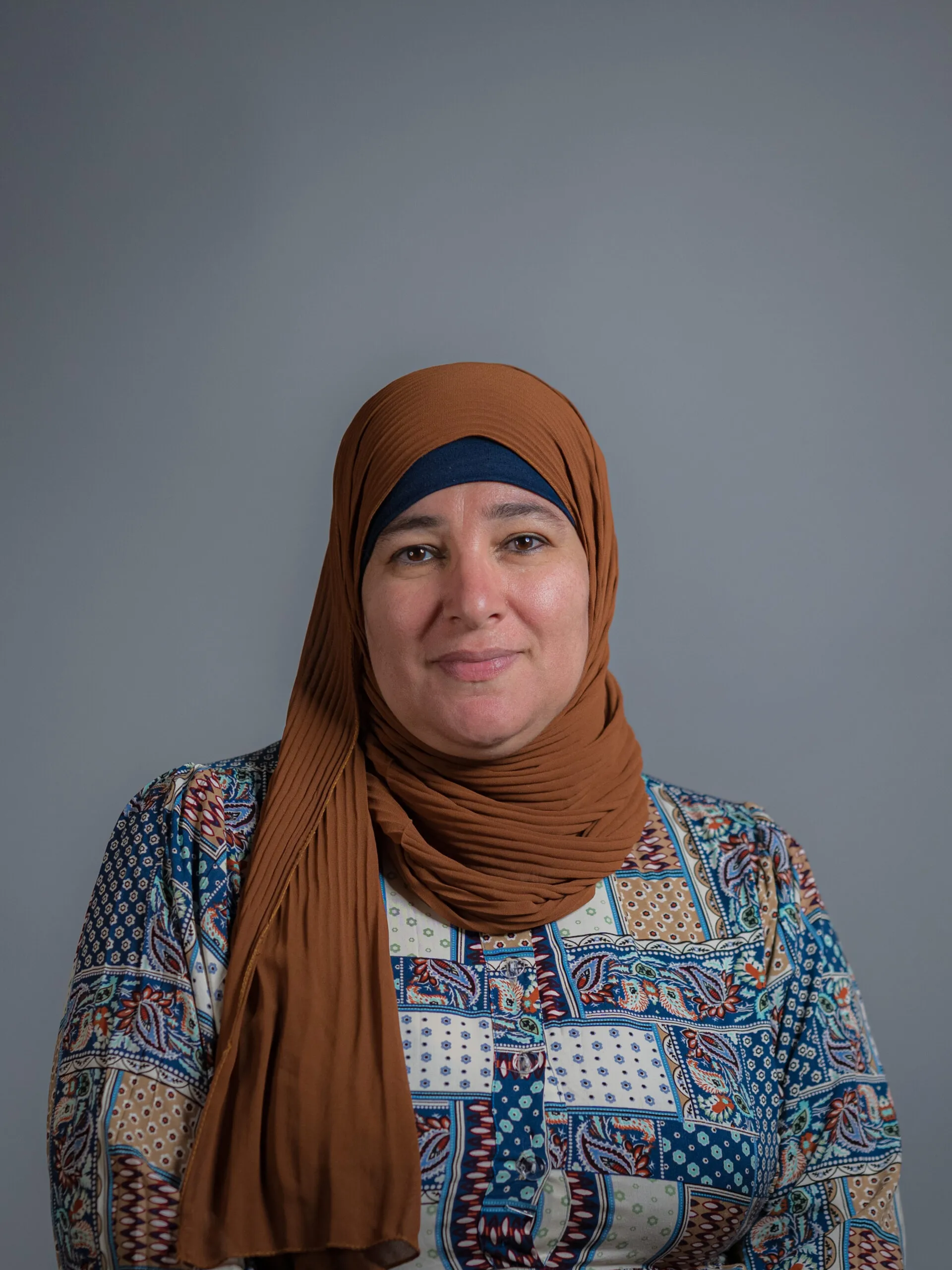 Professional headshot of Sana Alrefai for Arqam Academy